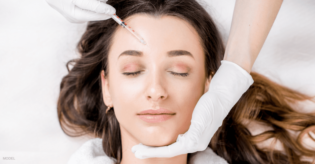 A woman enjoying a painless filler treatment thanks to Pro-Nox