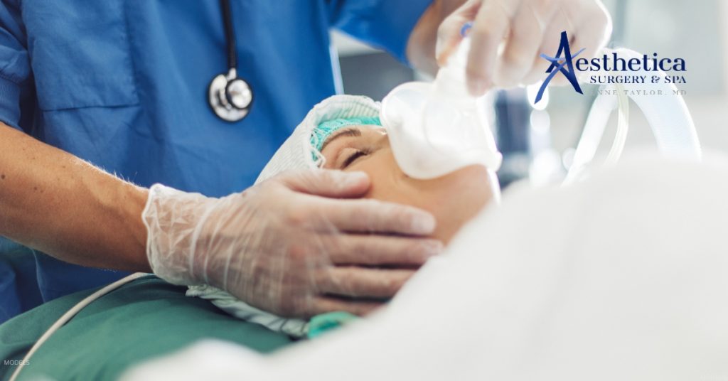Woman being prepped for cosmetic plastic surgery (models)